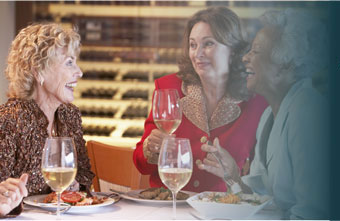 people laughing & drinking